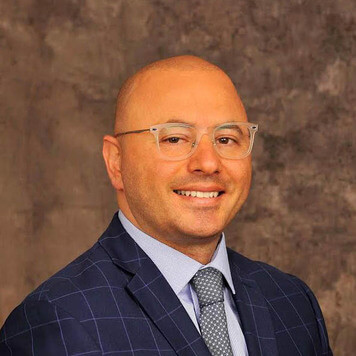 Portrait photo of doctor Alon Shalev, a periodontist in Denton, TX